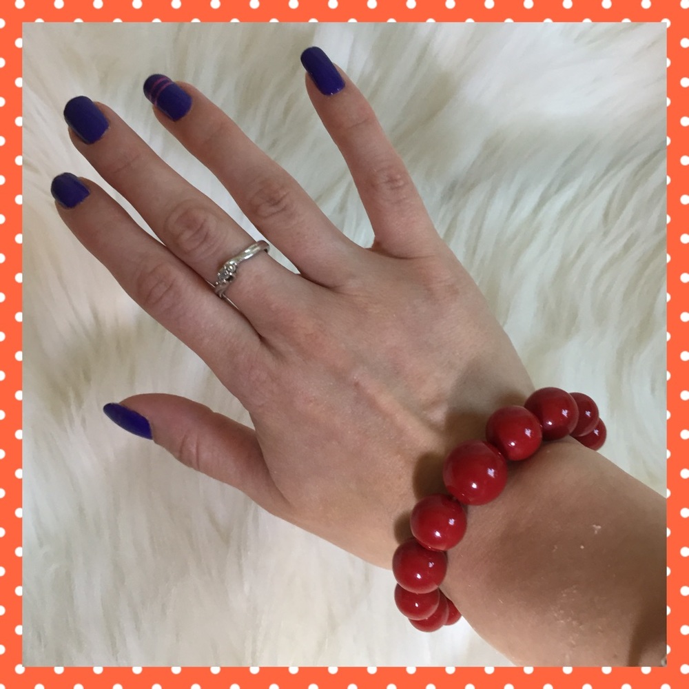 Large red beaded bracelet